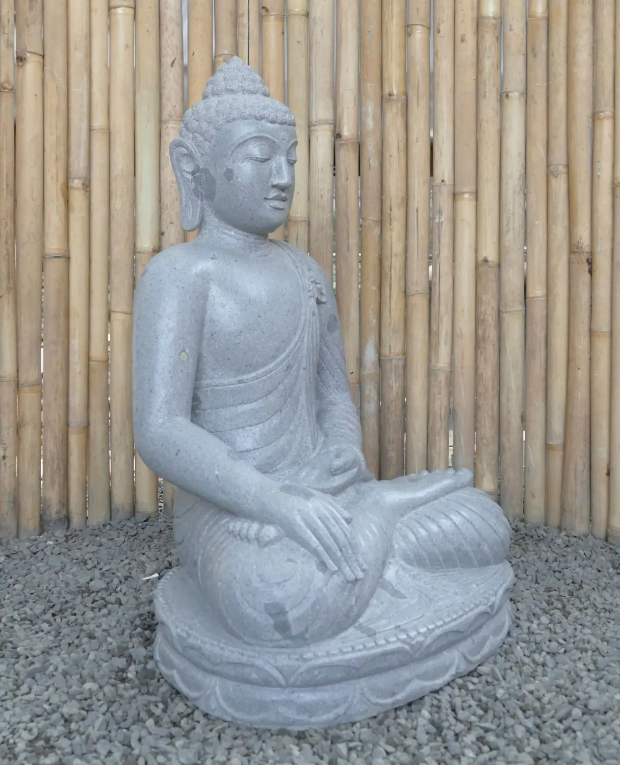  Product image 3 of the product “Seated Buddha made of Riverstone in Bhumisparsha - gesture of touching the earth. 86cm height. ”